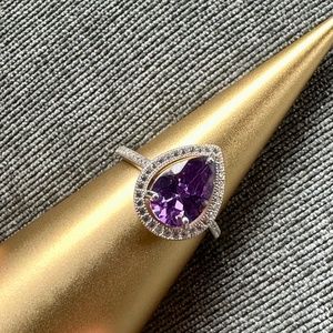 PEAR SHAPED AMETHYST & STERLING SILVER RING.